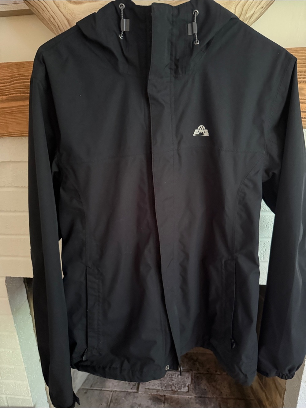Men's Black Hooded Rain Jacket with Subtle Logo